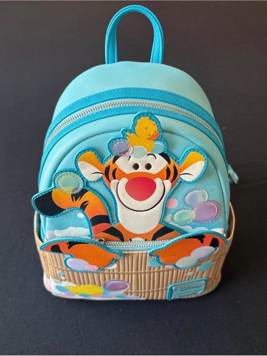 Loungefly Handbags - NWT Loungefly Tigger bath time Mini Backpack with Orange Accents